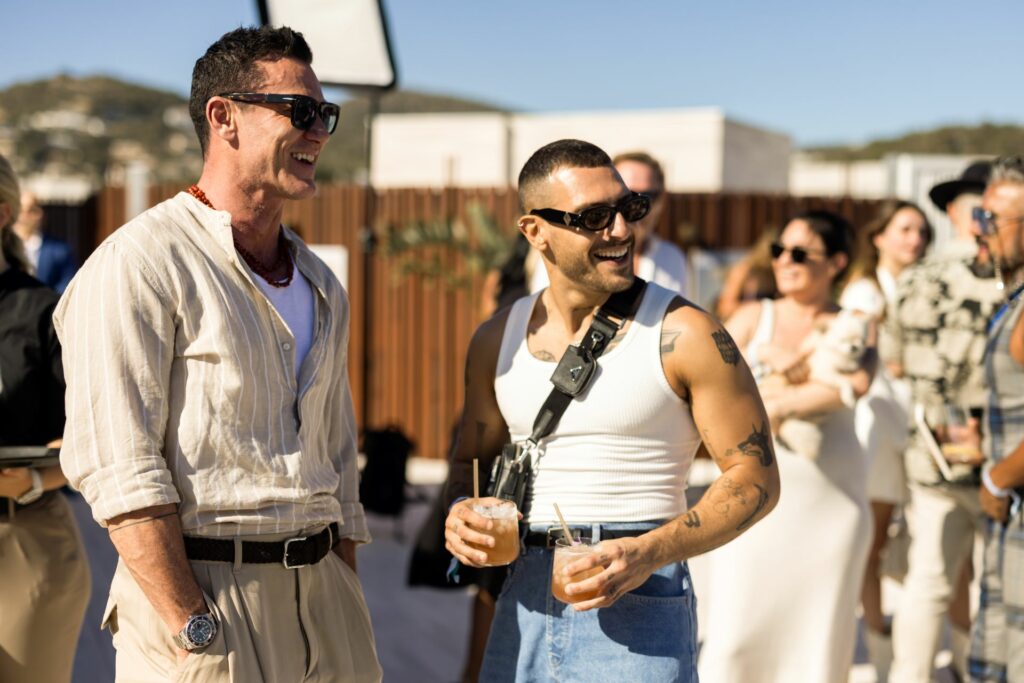 People attending a beach party in Ibiza