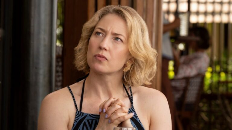 Carrie Coon as Laurie in The White Lotus, in a strapped top