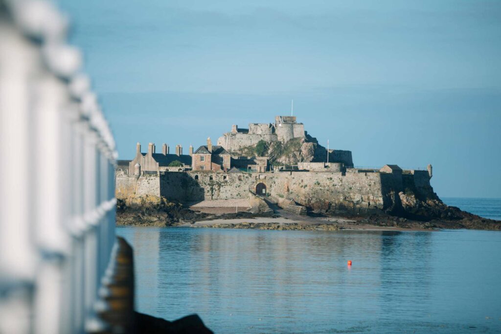A view of Mont Orgueil Castle in Jersey overlooking water