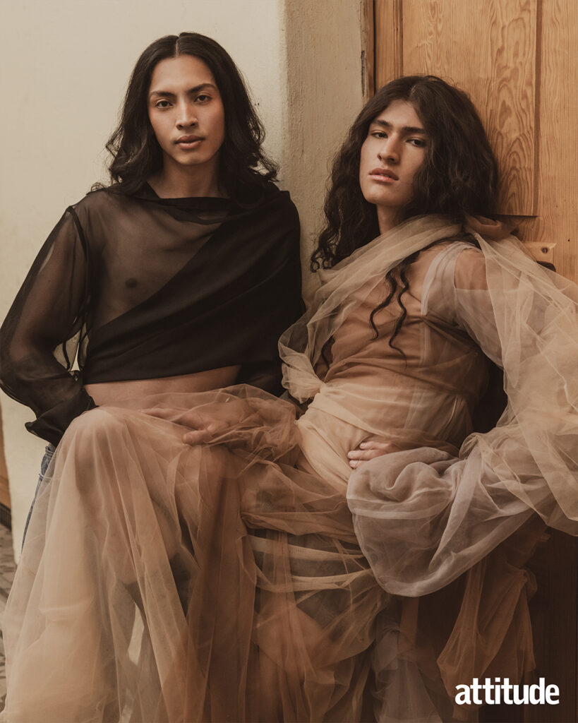 Two models pose in sheer tops and voluminous skirts
