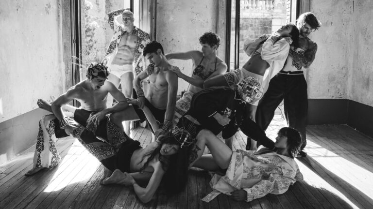 Models wear EGR in Attitude's main fashion shoot - black and white, all topless and leaning on each other in a room