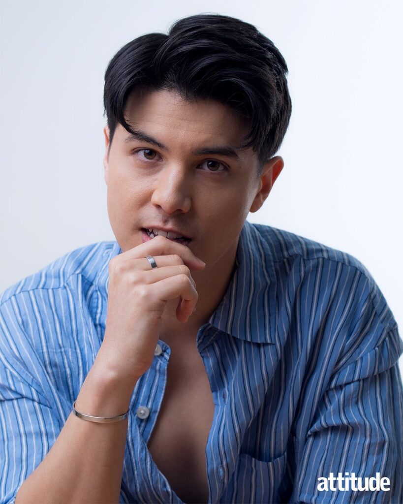 James Phoon looking into the camera wearing a blue shirt