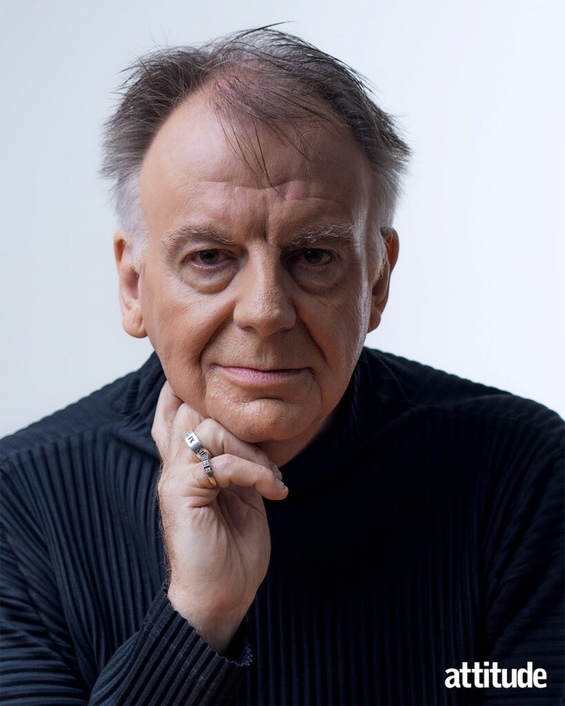 Paul CLayton wearing a black outfit and looking into the camera