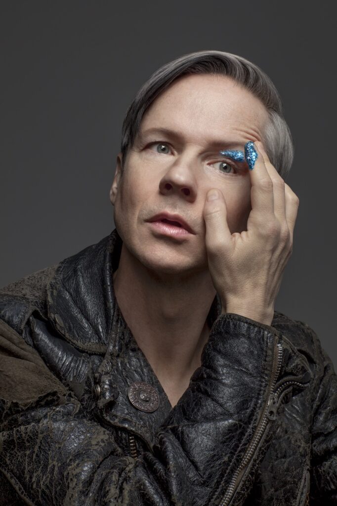 John a leather jacket applying glitter