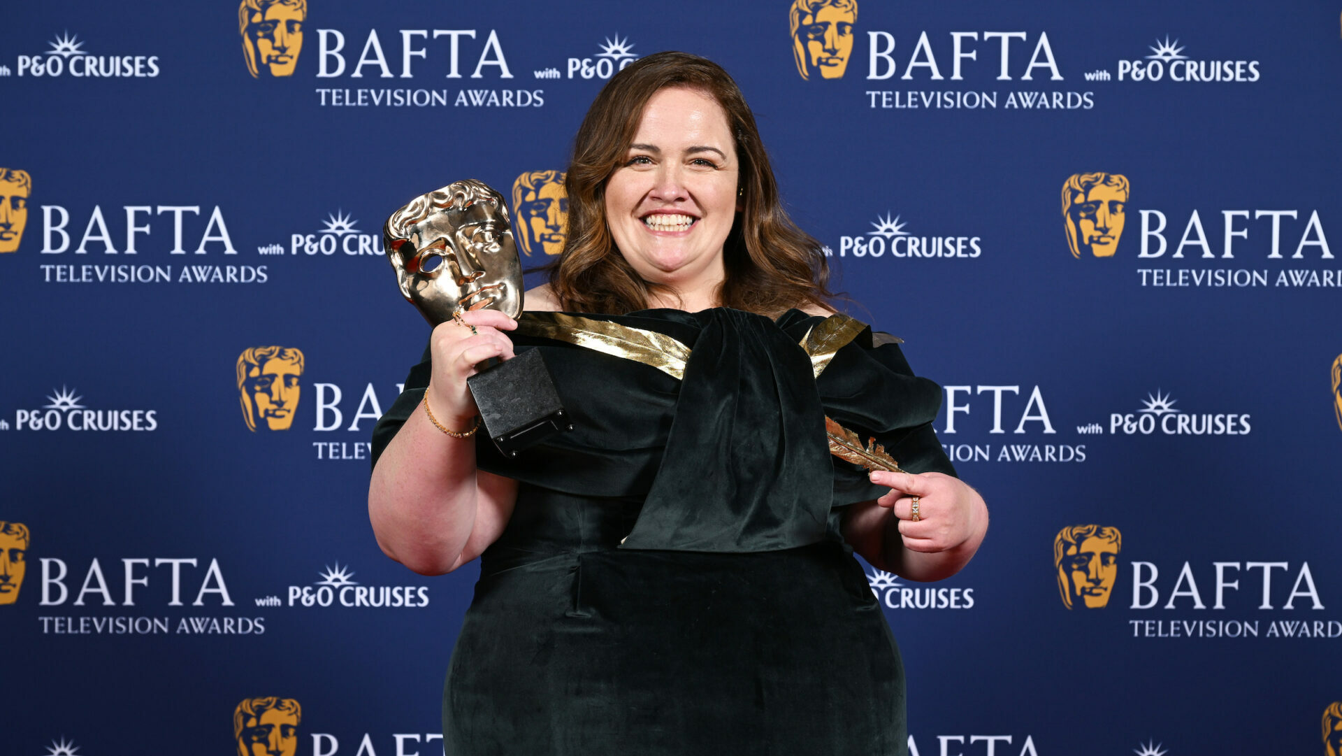 LONDON, ENGLAND - MAY 11: Jessica Gunning poses with the Supporting Actress Award for 'Baby Reindeer' inside the winners room at The BAFTA Television Awards with P&O Cruises at The Royal Festival Hall on May 11, 2025 in London, England.