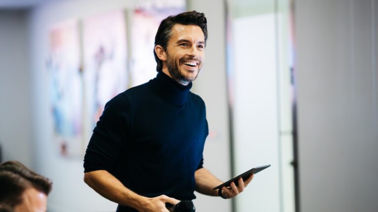 Jonathan Bailey in black turtle neck