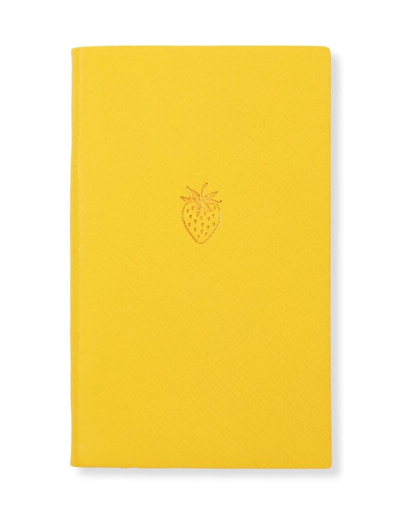 Yellow notebook with strawberry stamp