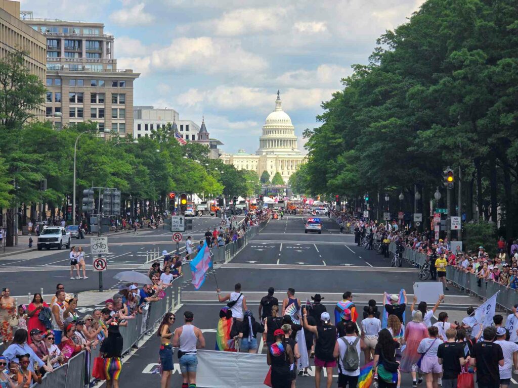 A view of the Capitol Building during a Pride march