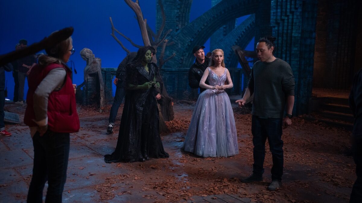 Cynthia and ari with others on set, plus director Jon