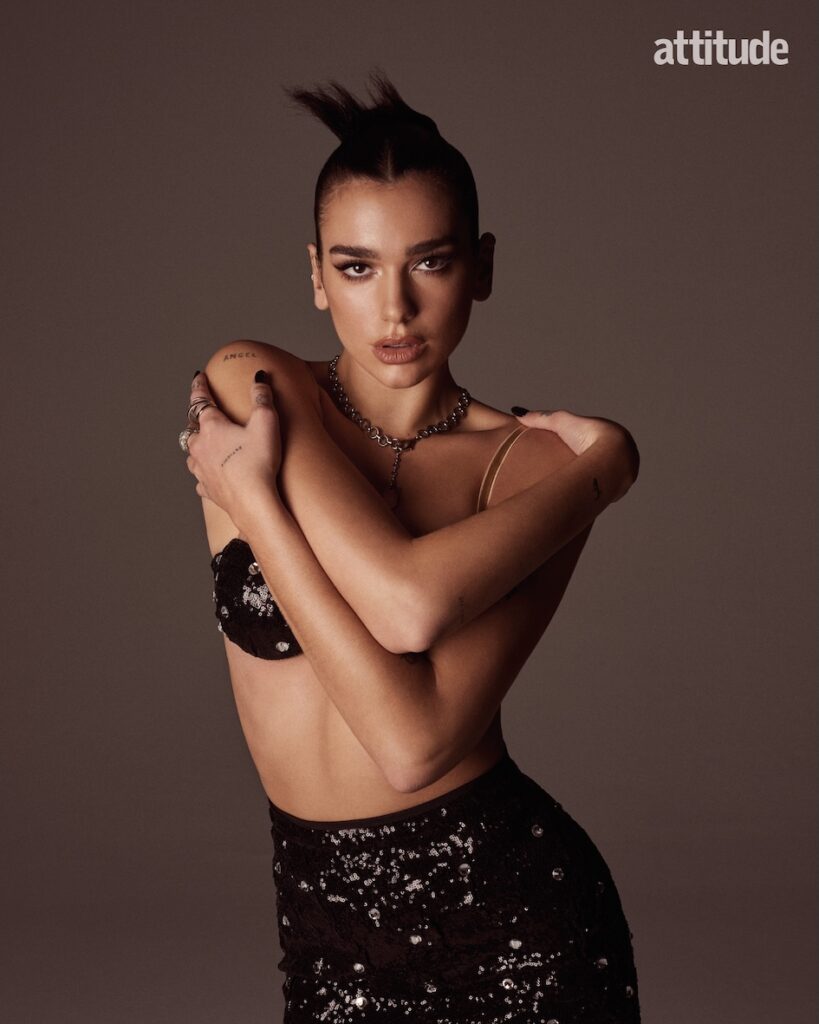 dua in a sequinned bra and trousers