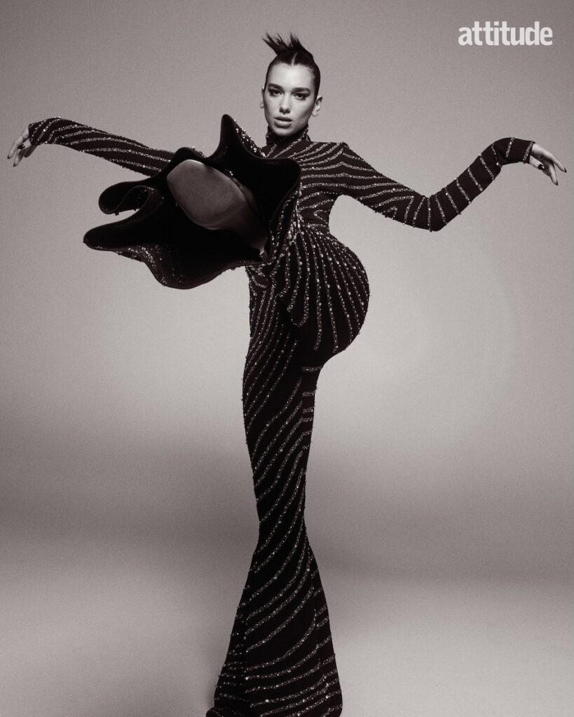 dua lipa in a black and white flared bodysuit
