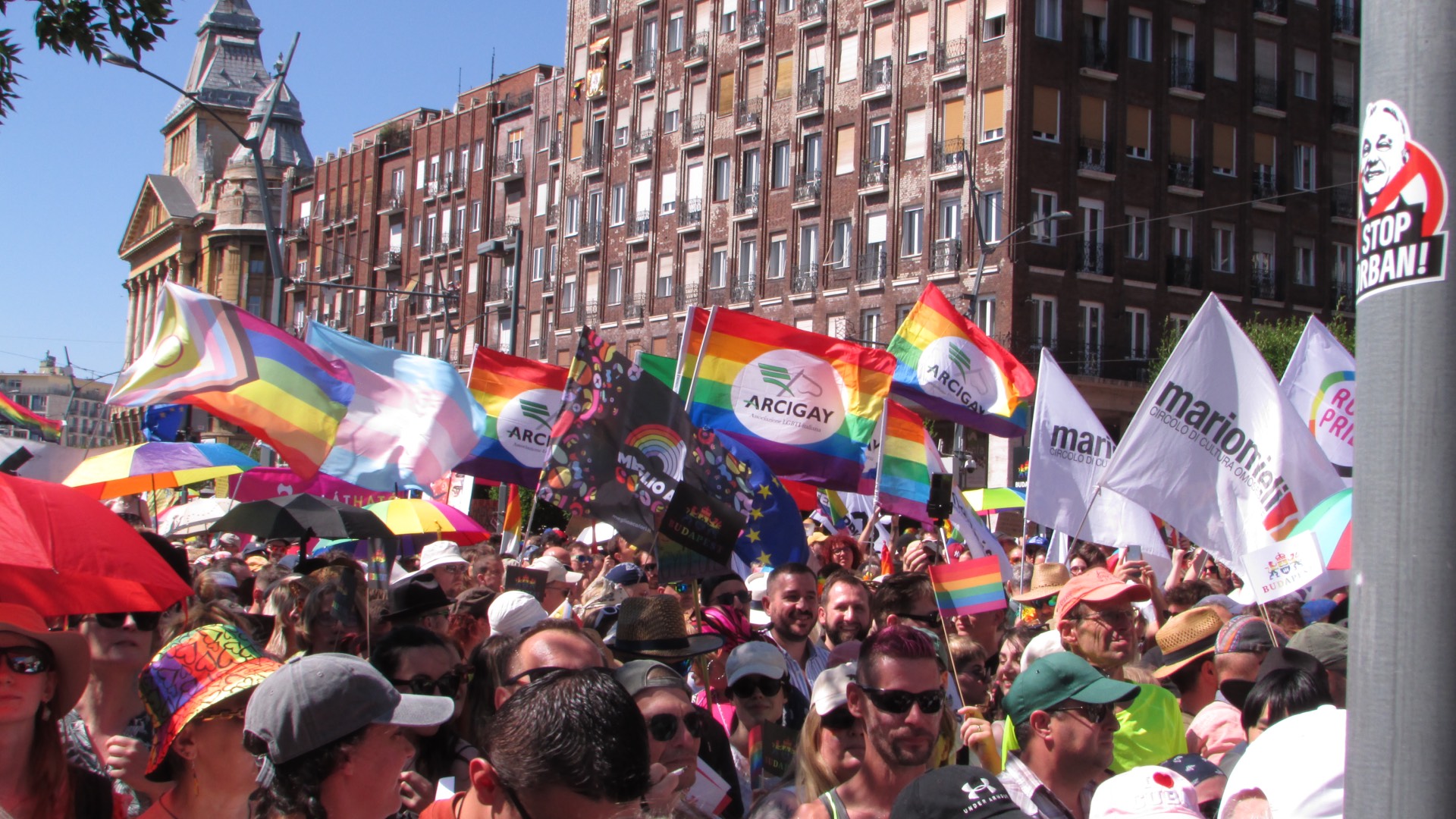 Attendees at Budapest Pride 2025 with flags