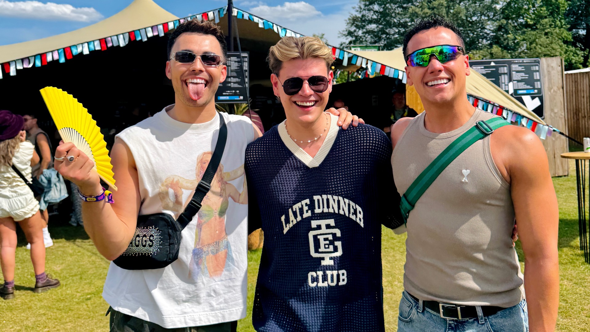 Joe Baggs and Kaine Ruddach with the author, Ashley, posing on the festival site