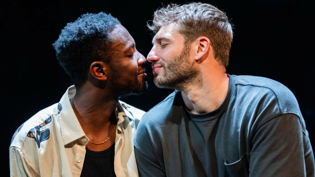 Omari Douglas and Alexander Lincoln noses touching in a performance of This Bitter Earth