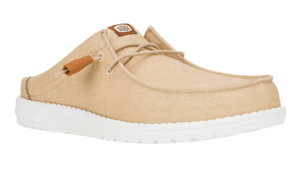 Tan wally slip on shoe with white sole