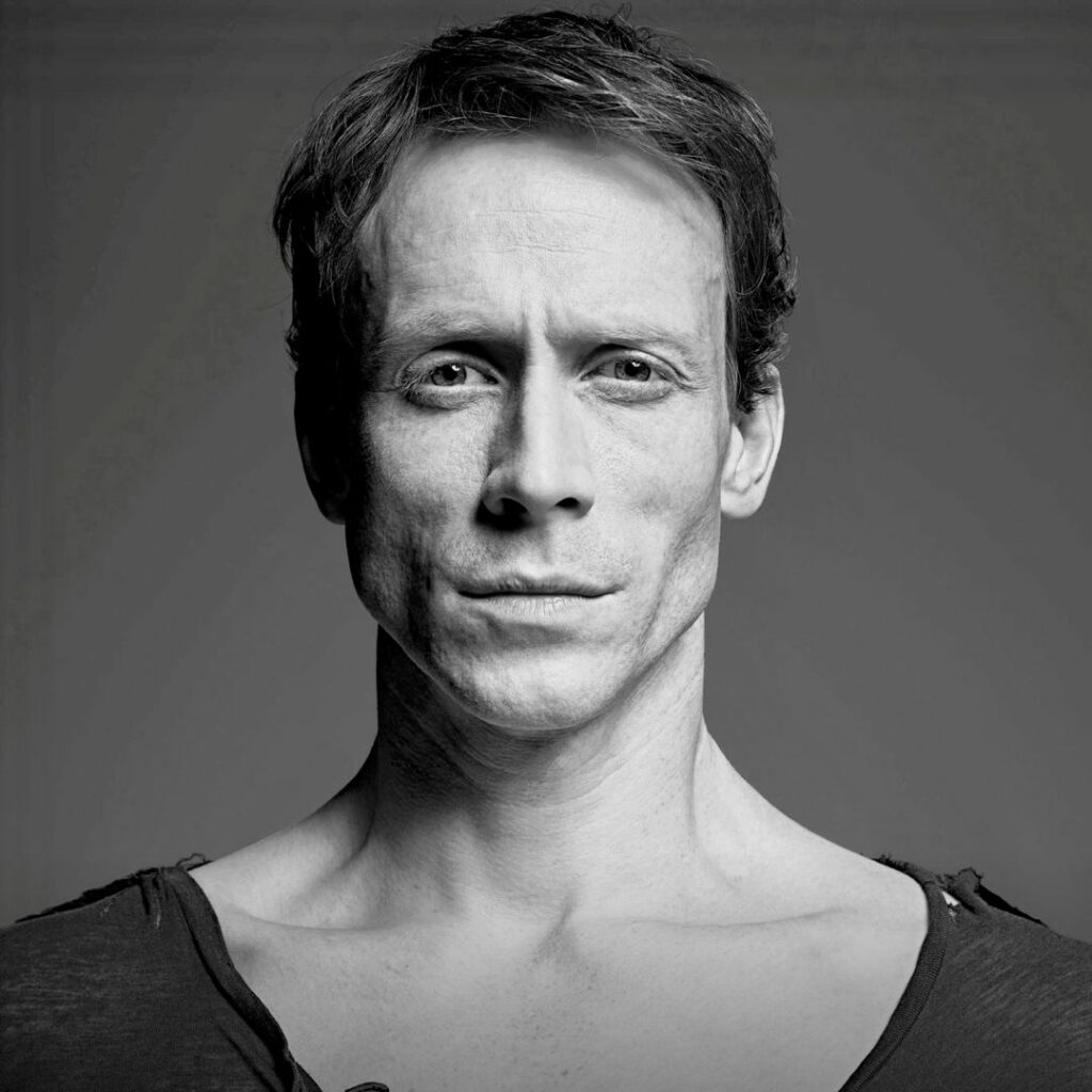 Black and white headshot of Ed Watson