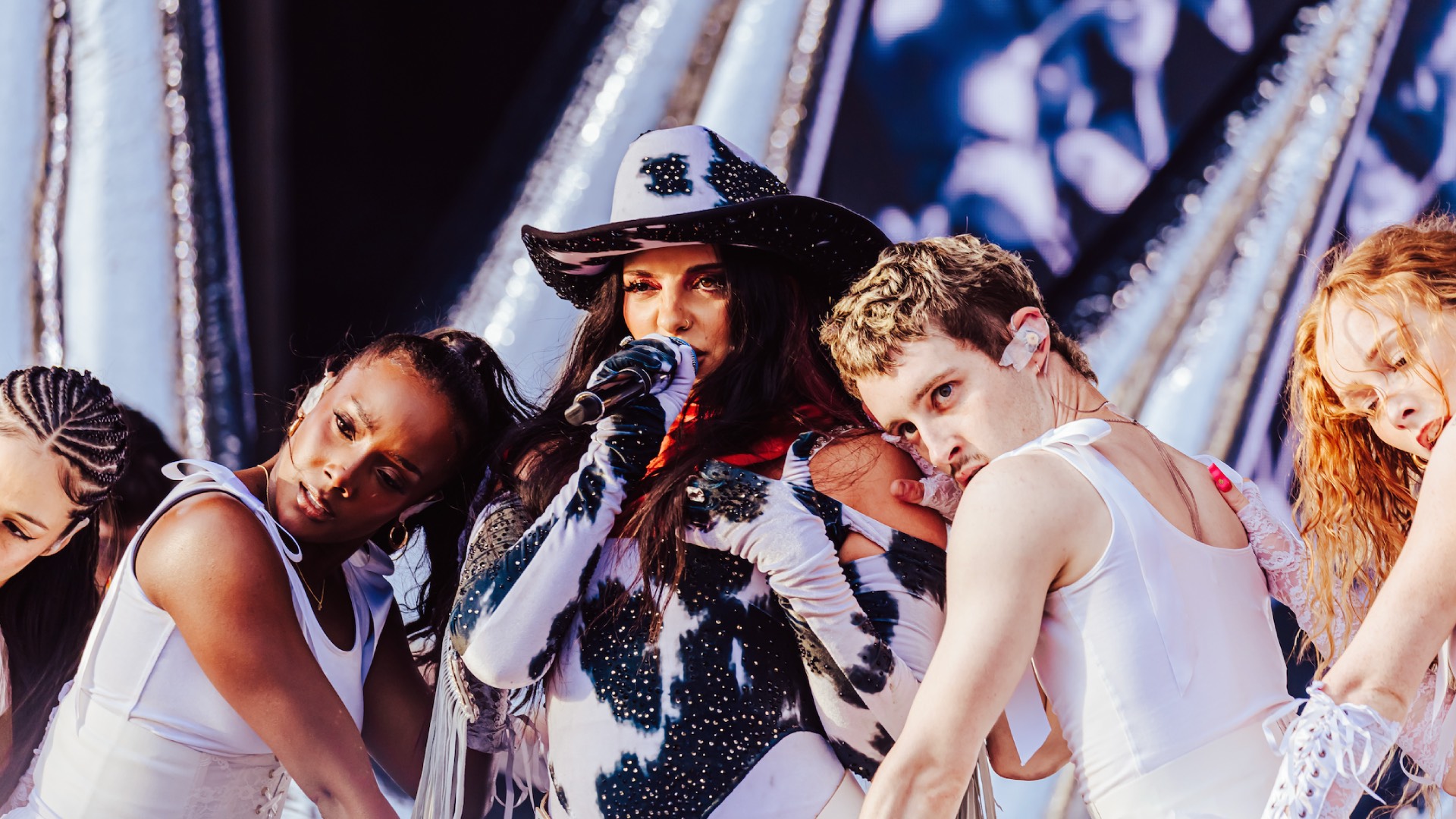 Jade Thirlwall performing at Mighty Hoopla in a cowgirl hat