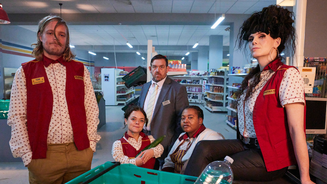 the cast of transaction sitting in a supermarket