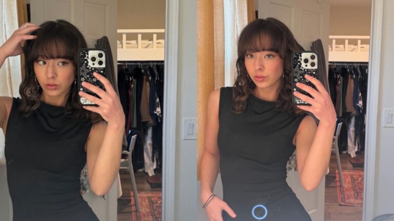 Aubrey Anderson-Emmons in a black dress taking a mirror selfie