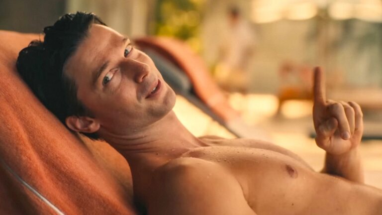 Patrick Schwarzenegger, topless and lying down, in a scene from the show (Image: HBO)