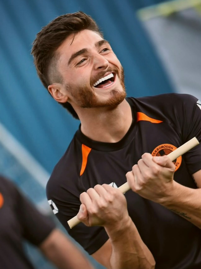 Josh Cavallo smiling during training