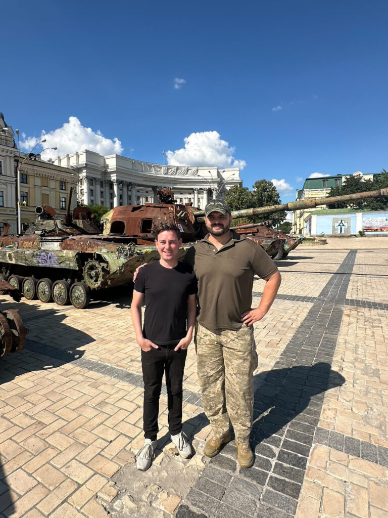 Ryan and Artur posing outside
