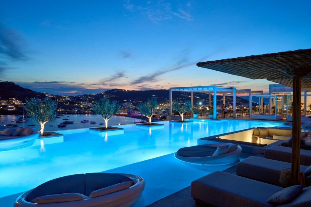 View of a hotel pool area at dusk