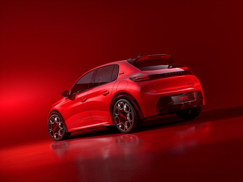 A red Peugeot car