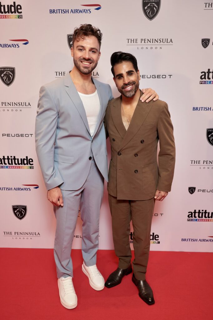 James Colebrook in a blue suit and Dr Ranj in a brown suit