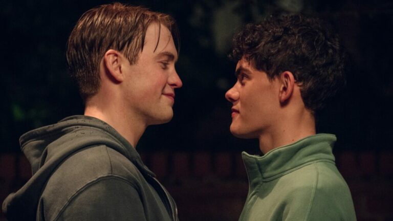 Kit Connor and Joe Locke looking into each other's eyes