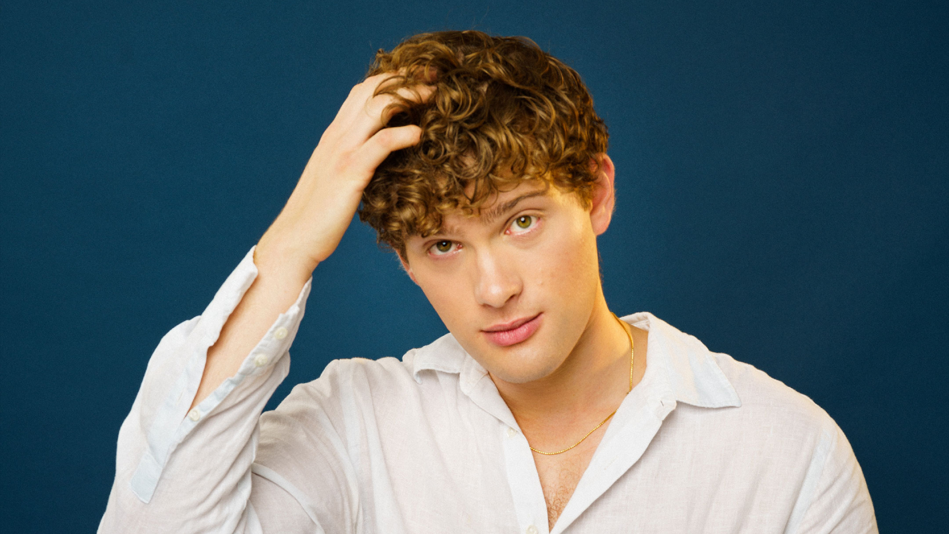 Leo Reich playing with his hair