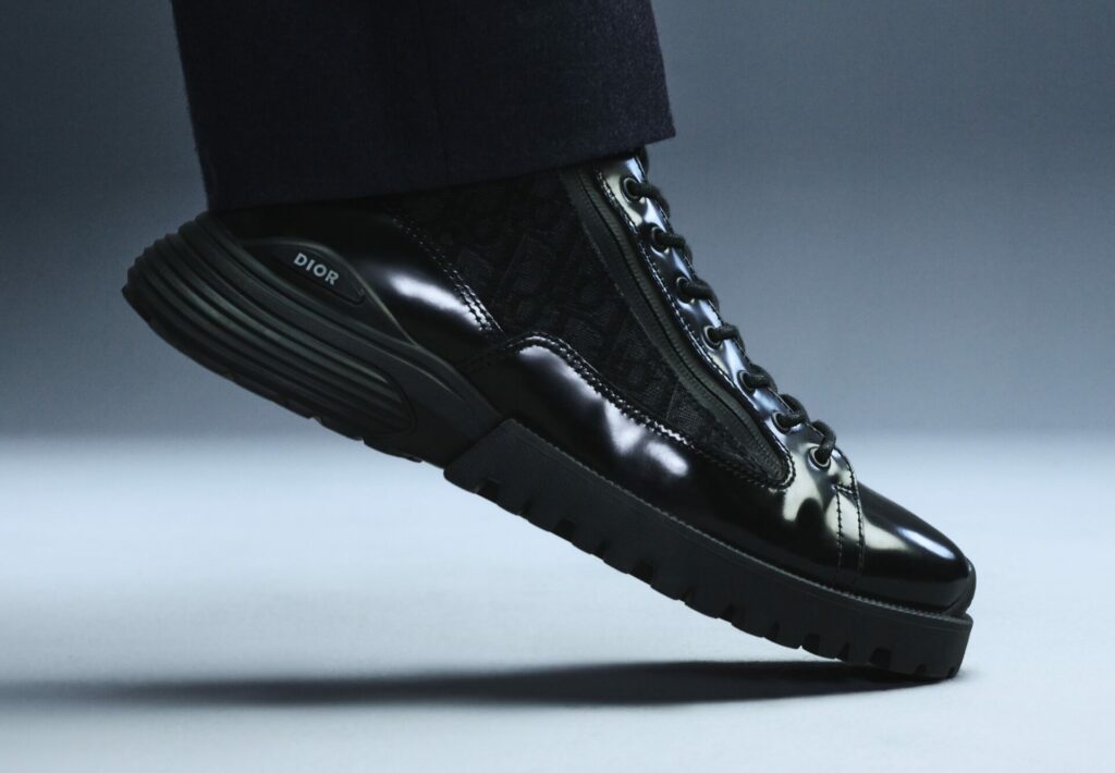 Close-up of Dior Men's black leather trainers