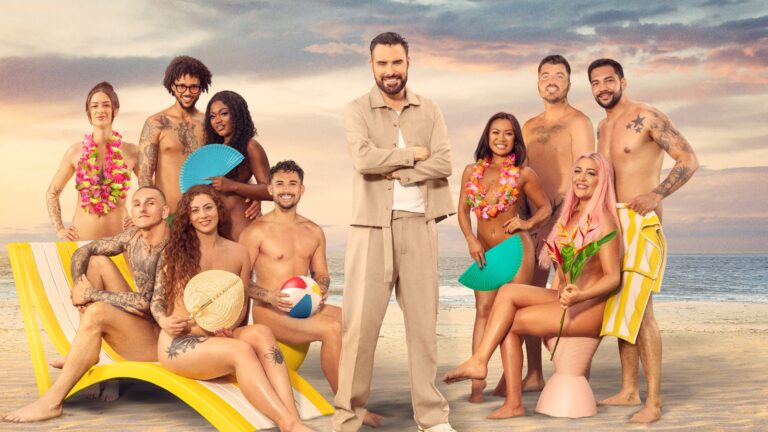 Rylan in the centre of the cast of Dating Naked series 2 pictured on a beach