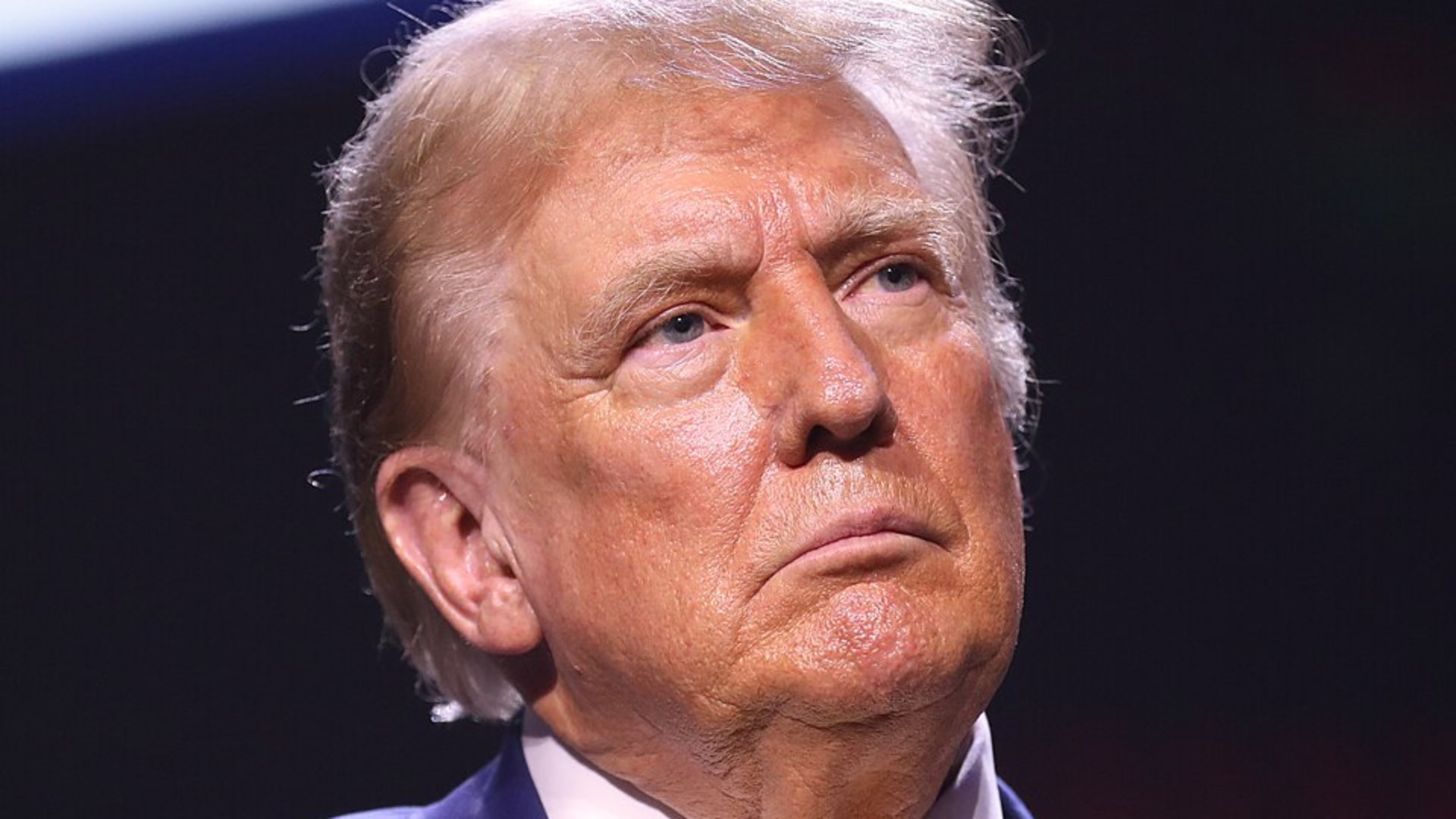 Donald trump looking up at the ceiling frowning