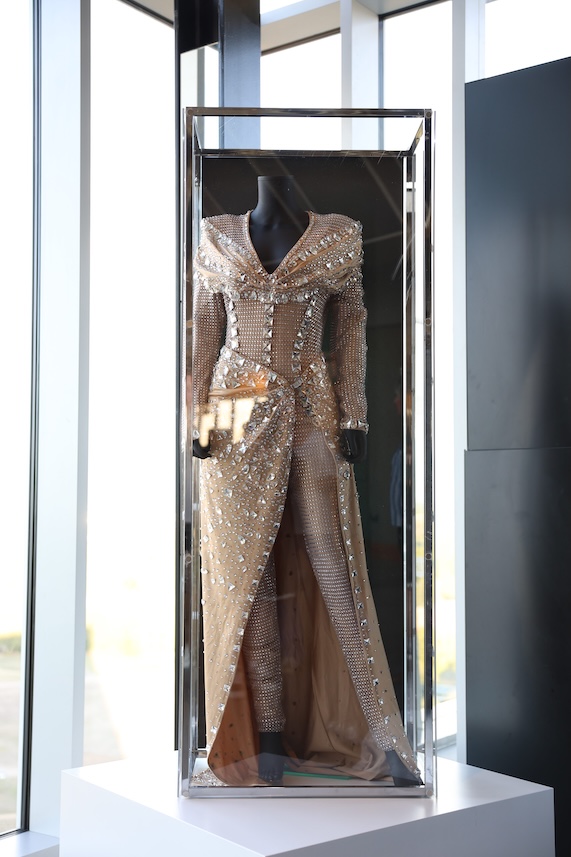 The Vivienne's dress on display in a cabinet