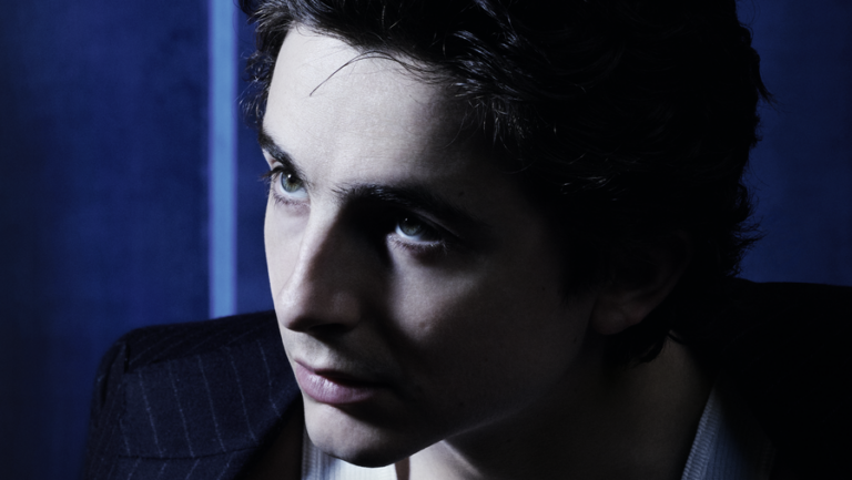 Close-up shot of actor Timothée Chalamet in the campaign for Bleu De Chanel L'Exclusif fragrance