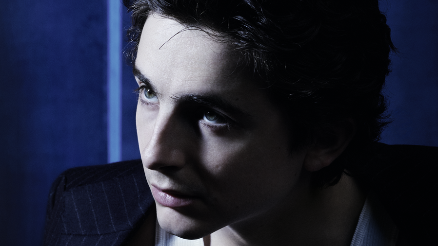 Close-up shot of actor Timothée Chalamet in the campaign for Bleu De Chanel L'Exclusif fragrance