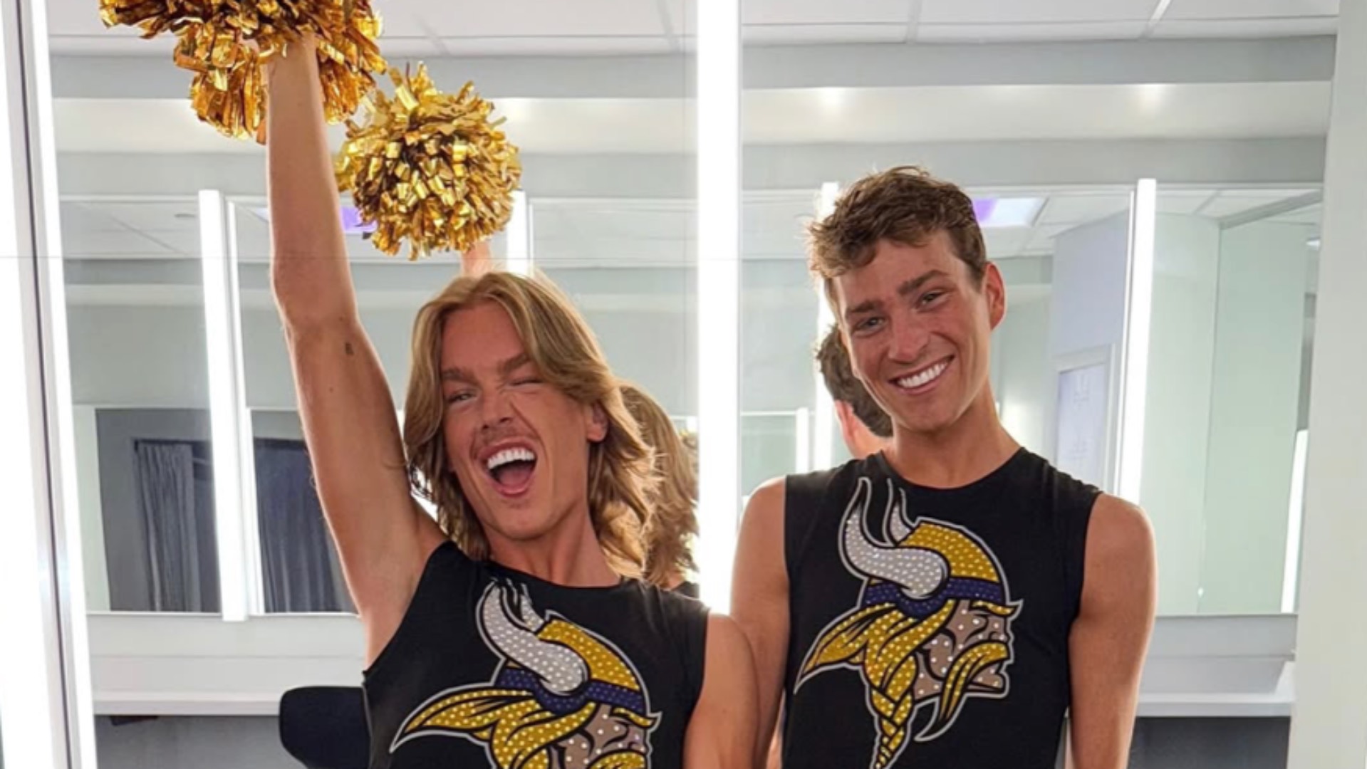 Blaize Shiek and Louie Conn in their Viking's cheer uniform