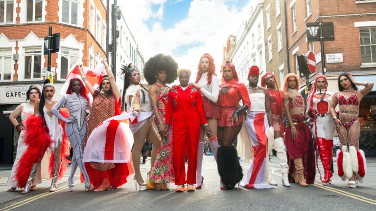 Tia Kofi with drag artists from different backgrounds dressed in red and white in a symbol of unity in the UK