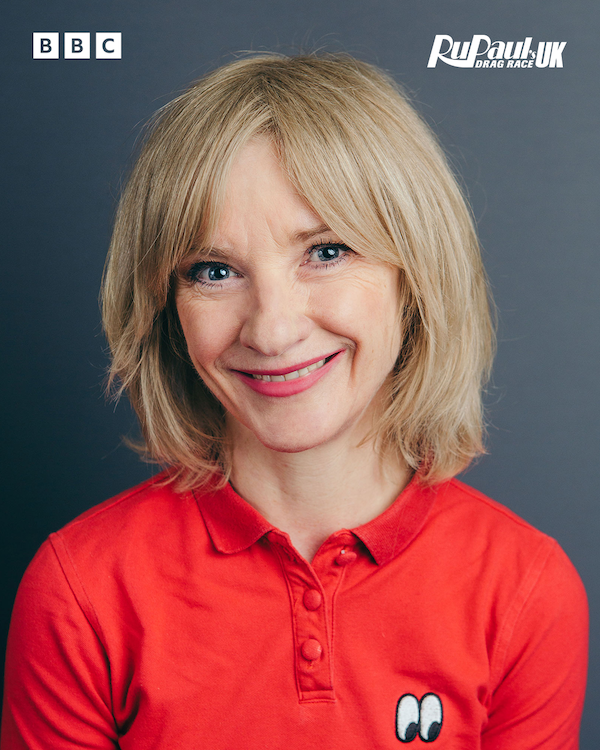 Jane Horrocks smiling wearing a red shirt
