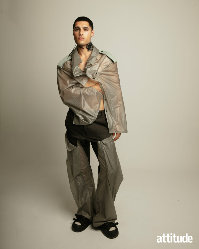 A model wears technical fabric sportswear in Attitude's fashion editorial. 