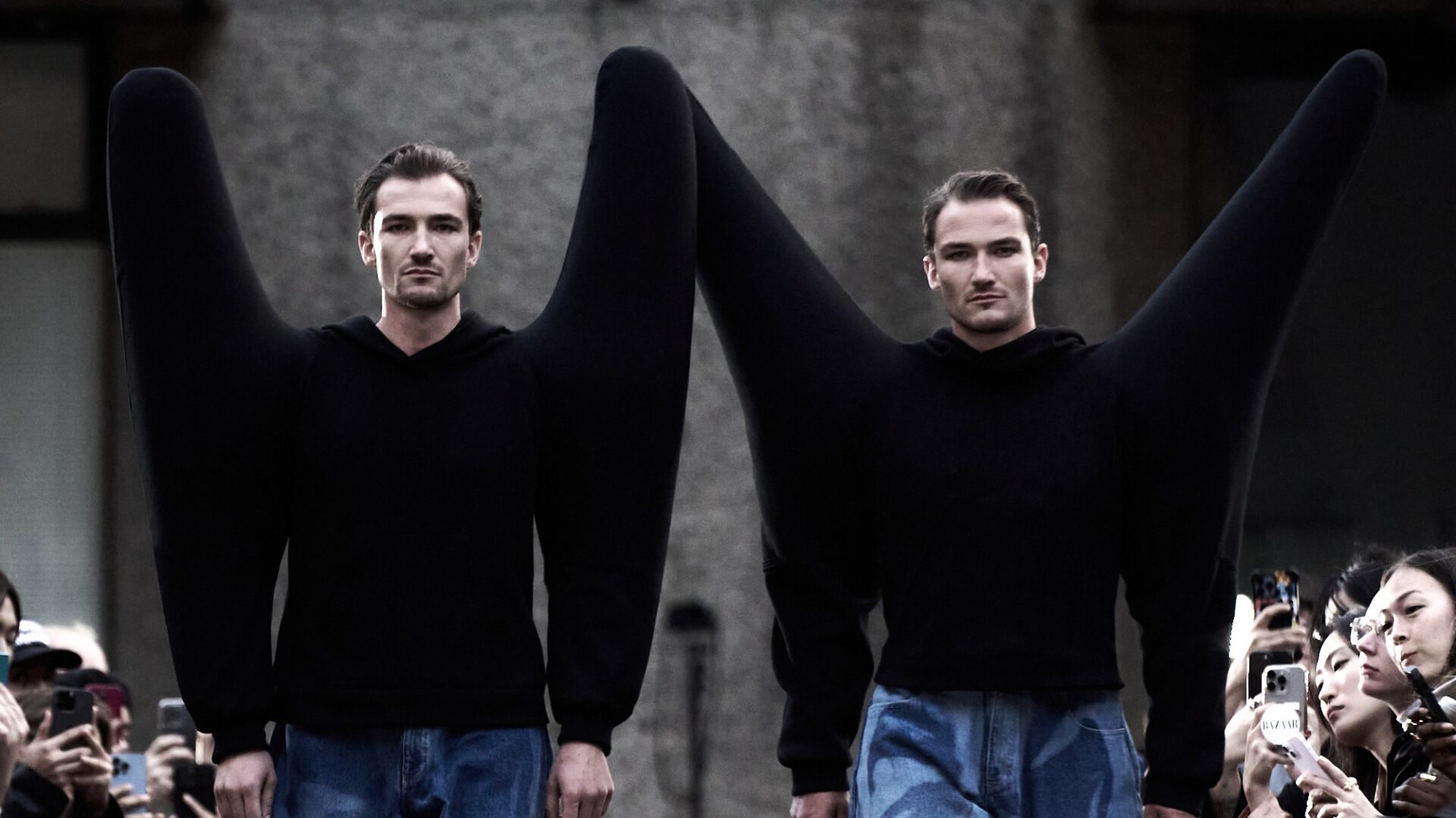 Twins Brett and Scott Staniland walk the HARRI Spring/Summer 2026 show at the Barbican Centre.
