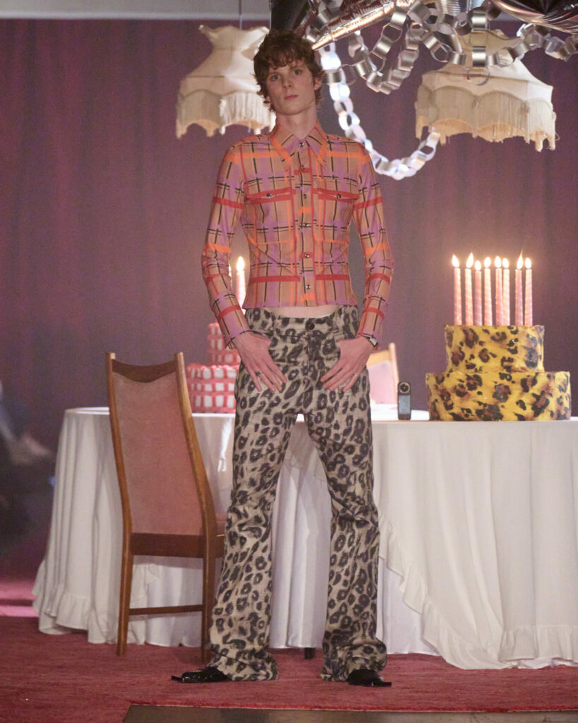 a skin tight check t-shirt and leopard trousers from from Maximilian Raynor's Spring/Summer 2026 collection