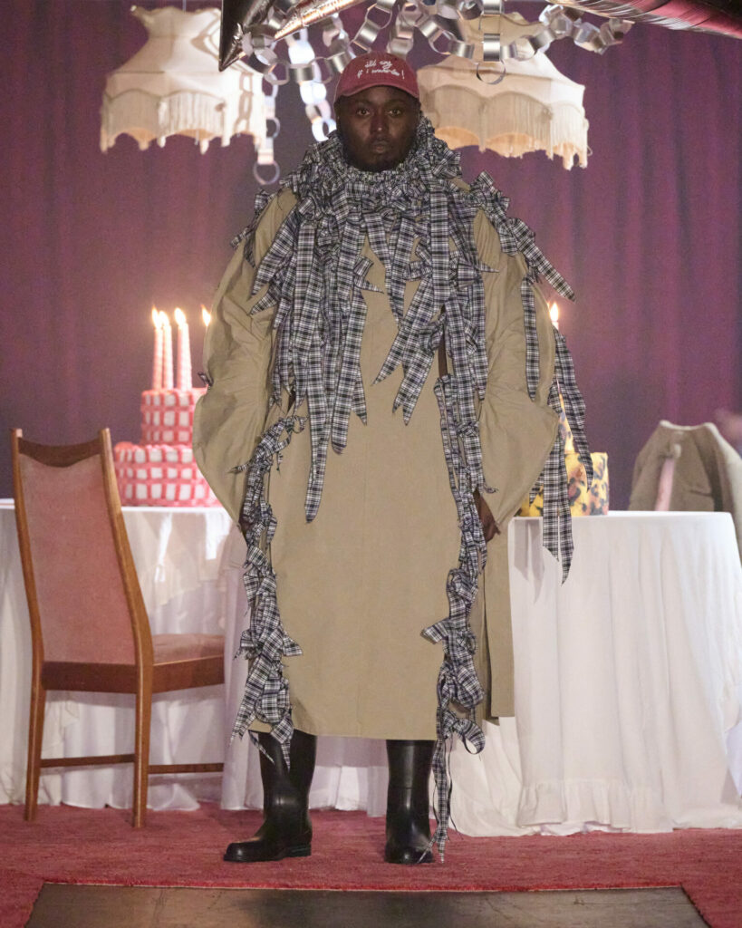 A trench coat with ribbon details from Maximilian Raynor's Spring/Summer 2026 collection