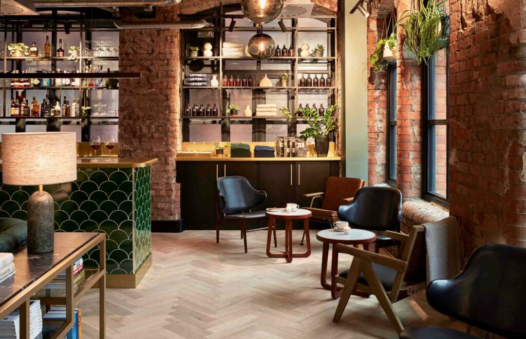 LEVEN hotel's reception area showing a bar and seating
