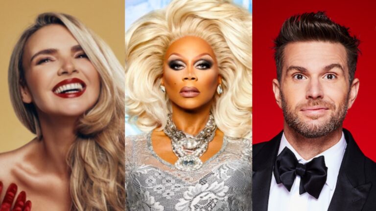 Nadine Coyle wearing red lipstick smiling on the left, RuPaul in the centre looking fierce in blonde wig and silver dress and Joel Dommett in a suit on the right