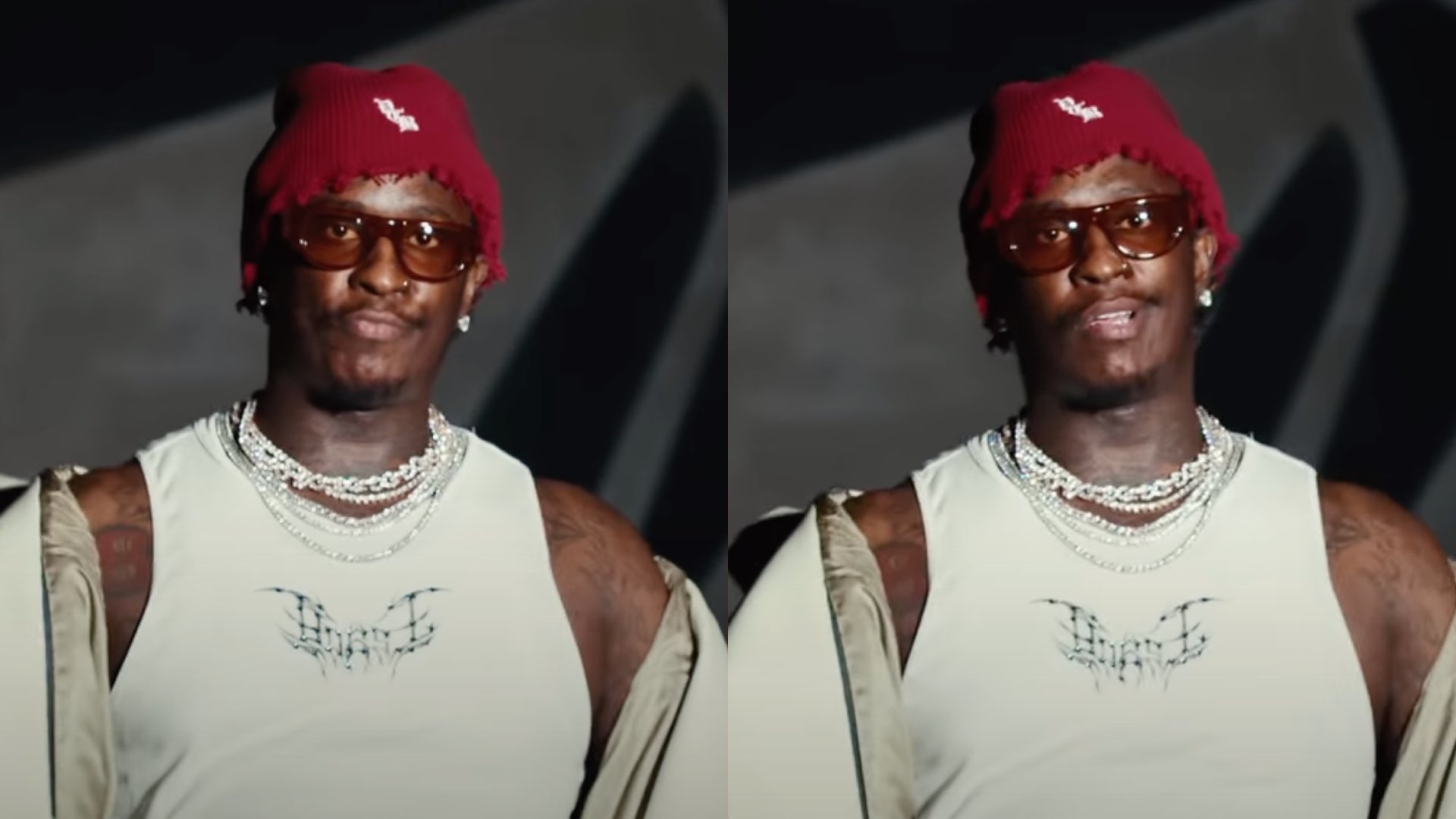 Young Thug wearing a red beanie and sunglasses