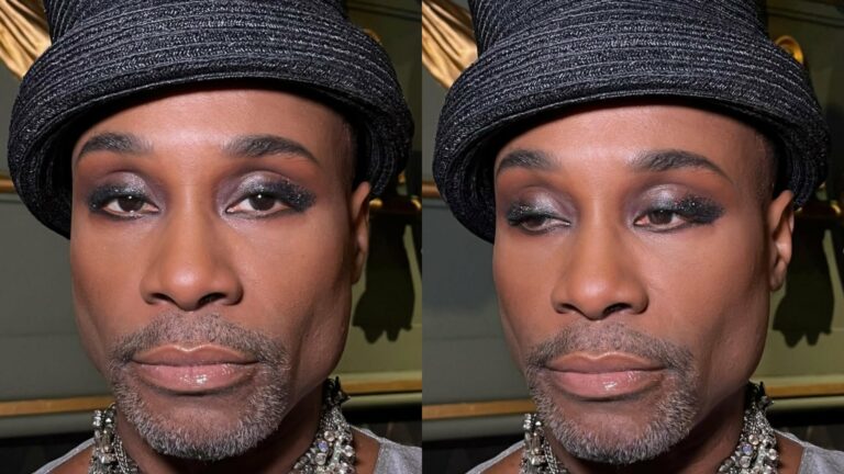 Billy Porter wearing a hat with glittery silver eye makeup