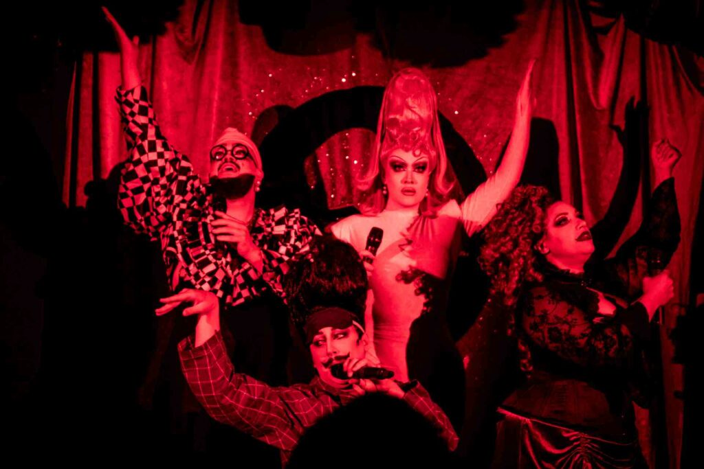 Fatt Butcher and the Send in The Clowns ensemble performing on stage