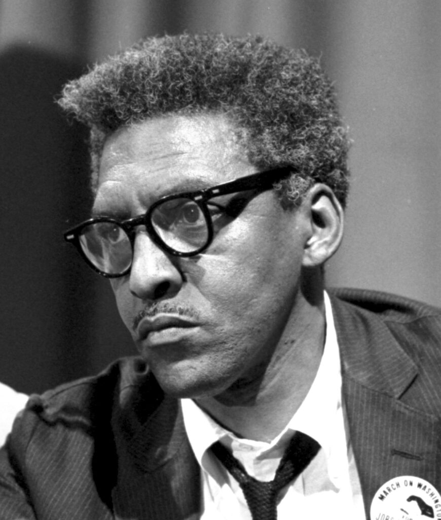 Baynard Rustin, black and white shot, black blazer, black tie and white shirt